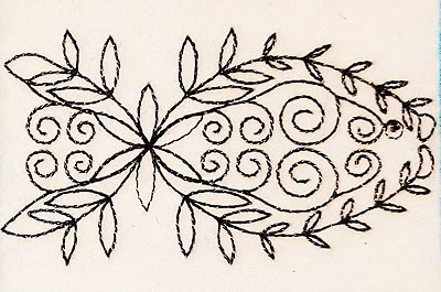 Artist trading card featuring a fish embroidered in black on cream background