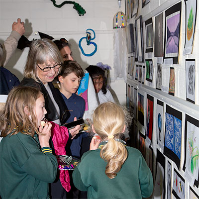 2022 Spring Art Show Childrens' Art Exhibition - children, visitors and grandparents viewing artwork
